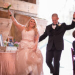 Bride and Groom during grand entrance at Worsell Manor in Warwick MD
